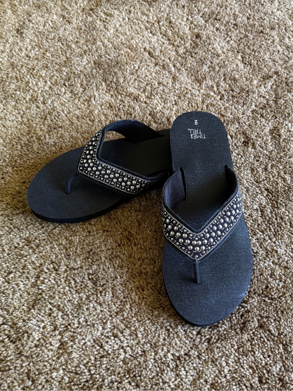 Black Time & Tru studded flip flops; perfect condition, never worn
